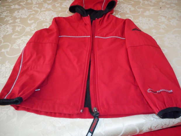 110-es fiú dzseki piros eladó