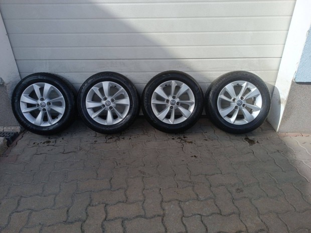 15" 4x100 Gyári Opel alufelni nyári gumi eladó!
