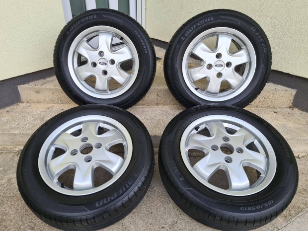 15" gyári Ford 4x108 alufelni 2 db újszerű gumival