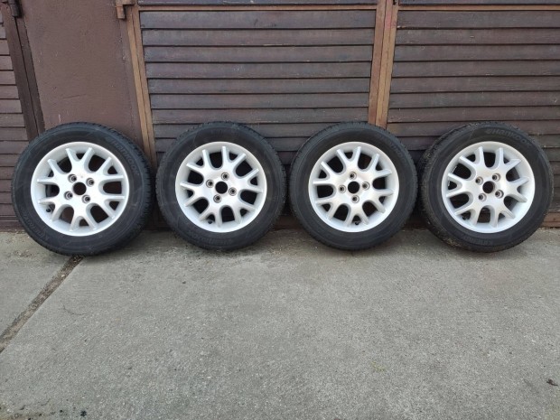 165/65 R14 Hankook nyári gumi 4x100 Suzuki alufelnivel eladó