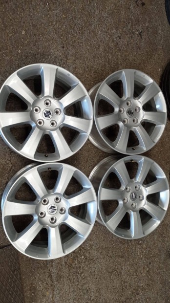 18 colos használt 5x114, 3 lyukosztású gyári Suzuki alu felni garnitúr