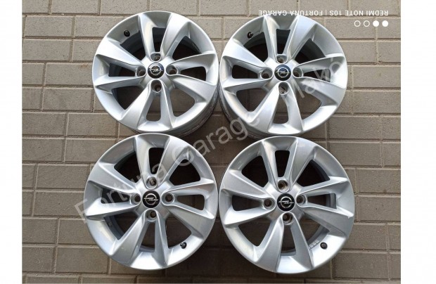 4x100 15" Opel Corsa / Adam használt alufelni garnitúra +Tpms