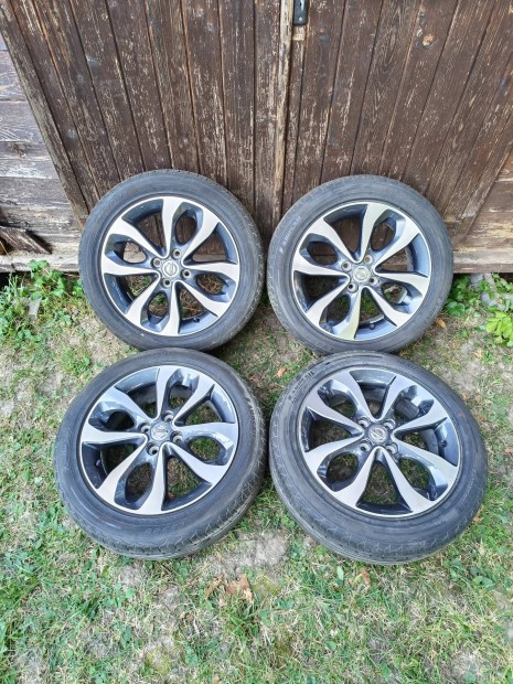 4x100 16 / 16" Nissan alufelni, 185/55 R16 nyri gumi