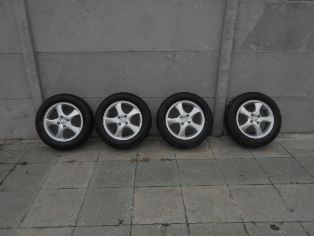 4x100 Suzuki 15" alufelni tligumival Toyota yaris Mazda 2