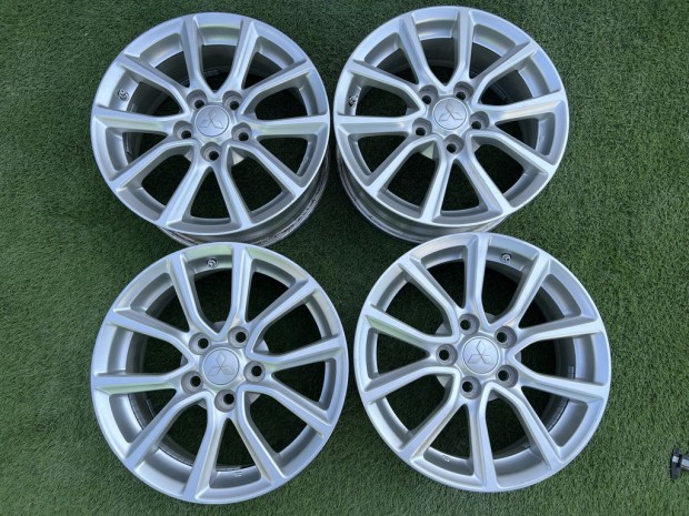 5x114.3 16" Mitsubishi gyári alufelni +TPMS szenzor 6,5Jx16h2 ET46