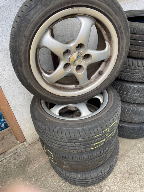 Alutec 5x100 R14 alufelni szett Laufenn 195/50 R15 nyri gumi DOT5119