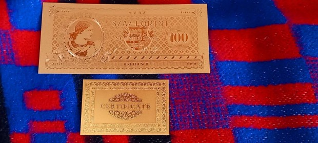 Aranyozott, plasztik, fantzia 100 forint 