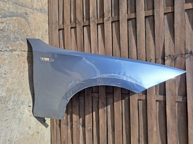 BMW E81 E82 E87 E88 jobb első Quarzblau Metallic sárvédő - sérült