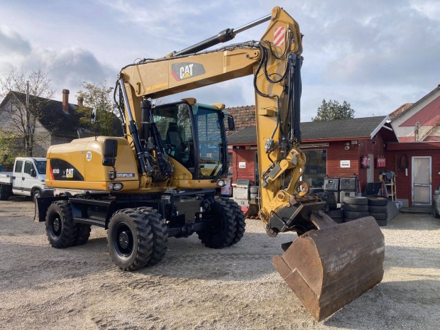 CAT Caterpillar M316D 17 t klímás gumikerekes kotrógép eladó