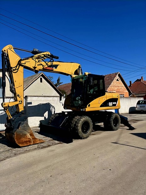 CAT M313D Elad