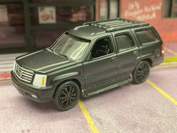 Cadillac Escalade modellaut - Johnny Lightning 1:64 mret