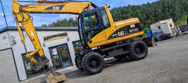 Caterpillar M313C gumikerekes forgkotr