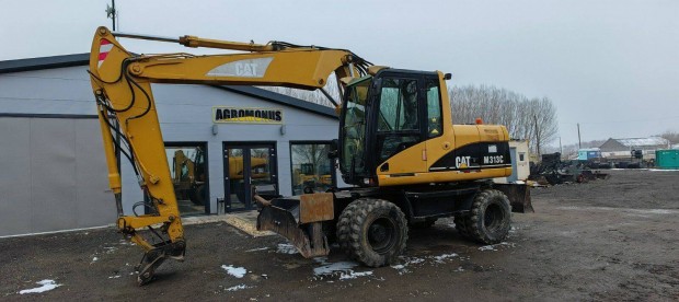 Caterpillar M313C gumikerekes forgkotr