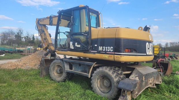 Caterpillar M313C gumikerekes forgókotró eladó