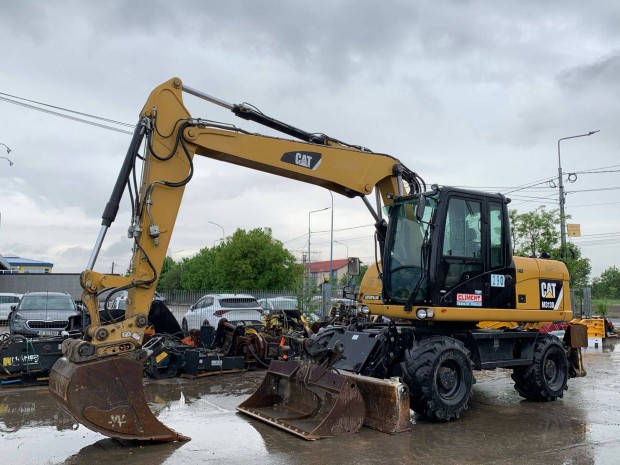Caterpillar M313D gumikerekes kotró