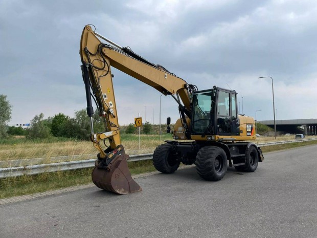 Caterpillar M313D gumikerekes kotrgp / 9.937 zemra / Lzing