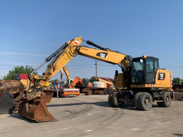 Caterpillar M318F gumikerekes kotró