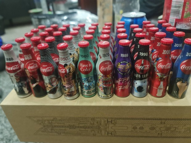 Coca cola 100 ves jubileumi mini alu palackok