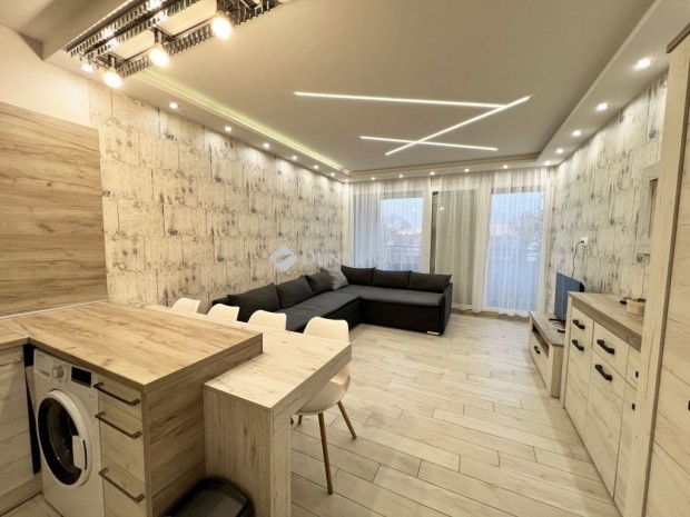 Debreceni 34 nm-es lak�s kiad�