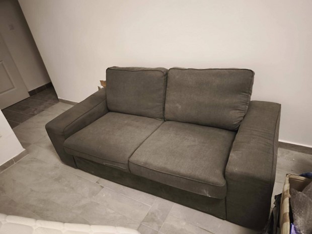 Eladó a képen látható 187x88 széles és 41 cm magas szürke kanapé