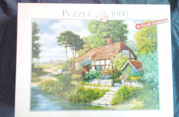 Eladó bontatlan csomagolású 1000 db-os puzzle - Házikó a patak partján