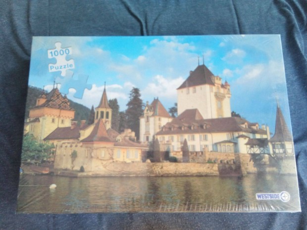 Eladó bontatlan csomagolású 1000 db-os puzzle - Kastély a tó partján