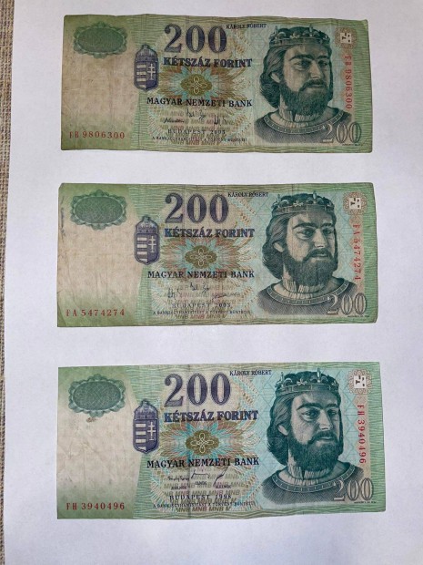 Eladó papír 200 Ft és 10 Forintos bankjegy