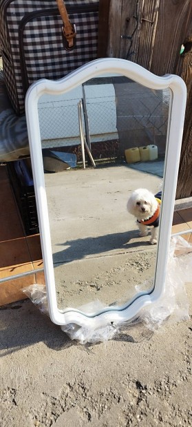 Eleg�ns �velt fali t�k�r