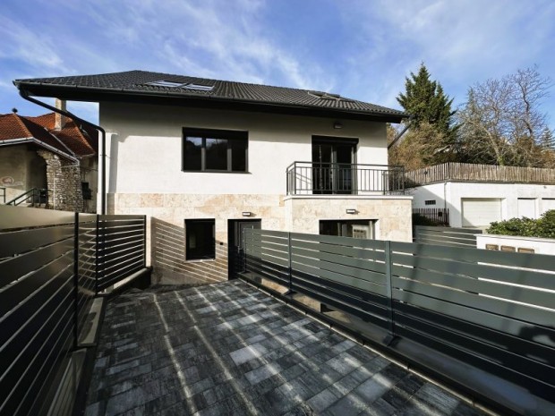 Exkluz�v f�ldszinti lak�s terasszal �s gar�zzsal elad�