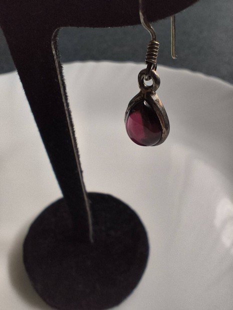 Ez�st f�lbeval� gr�n�ttal 