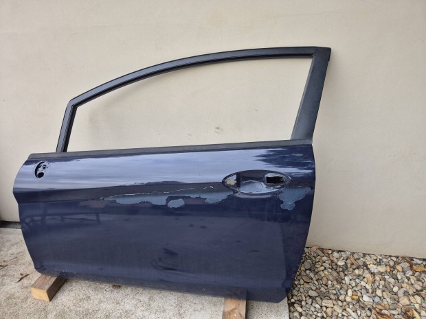 Ford Fiesta MK7 3 ajtós bal első ajtó (fényezéshibás)