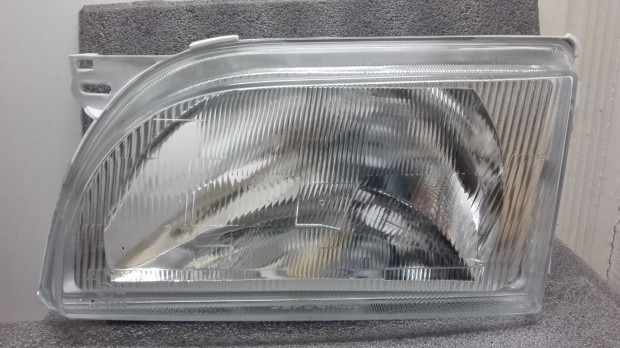 Ford Transit fényszóró bal 1991 -> 1994 (H4) üvegbúrával