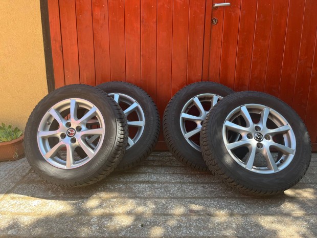 Gy�ri Mazda 2 alufelni + t�li gumi 185/65 R15