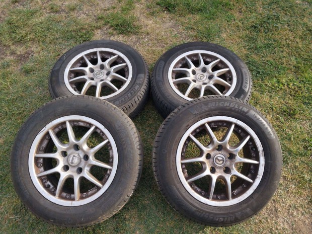 Jó állapotú alufelni szett Michelin nyári gumikkal 5x114,3 R15 195/65