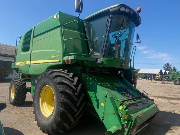 John Deere W650 kombjn gabonaasztallal, szlltkocsival