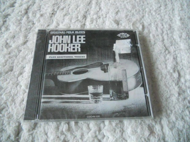 John Lee Hooker : original folk blues plus CD ( j, Flis)