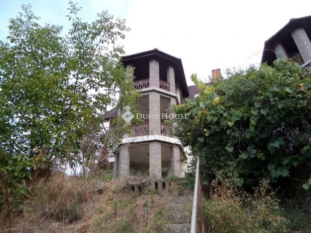 Koml�n szilv�si ikerh�z