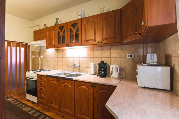 Kunszentm�rtoni 2 szintes, el�-�s h�ts� kertes sorh�z elad�