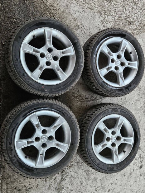 Mazda 15" gy�ri alufelni + t�ligumi szett