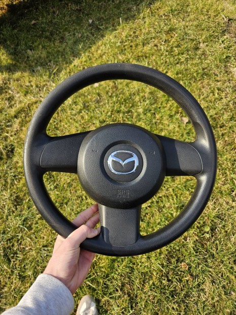 Mazda 2 (De) kormny - lgzskkal