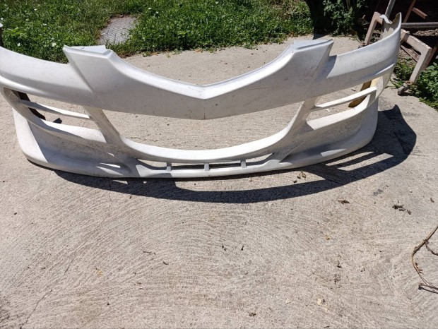 Mazda 323F első lökhárító üvegszálas