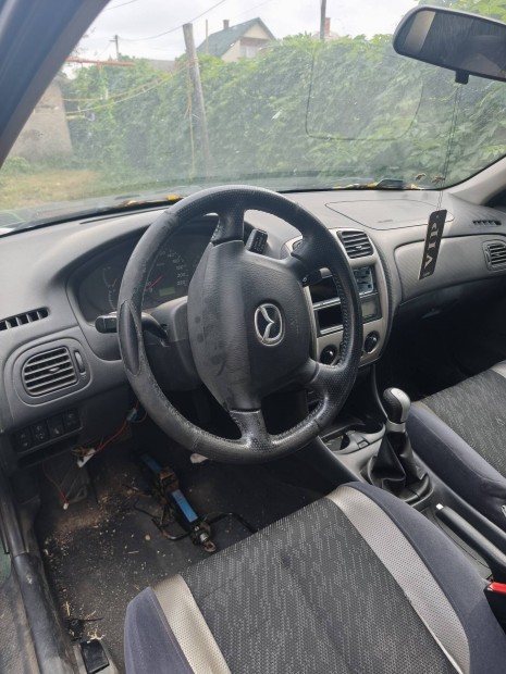 Mazda 323f 1.5 benzin alkatrészek-bontás vagy egyben