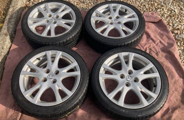 Mazda alufelni 4x100 Falken 195/45 R16 gumikkal