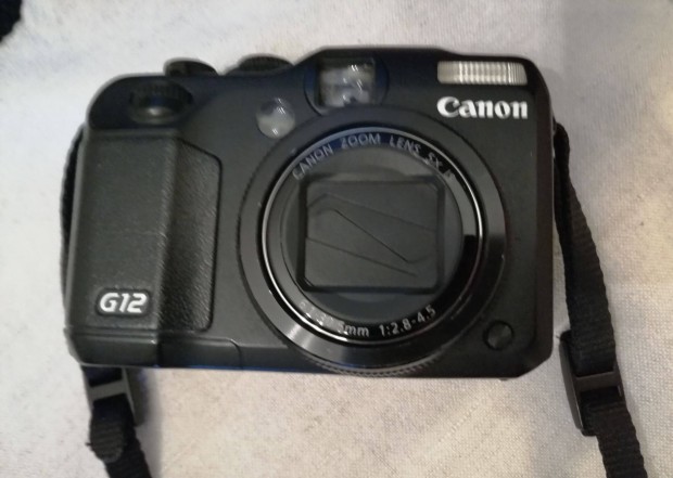 Megvlnk Canon G 12 gpemtl, melynek srlt a lencsje