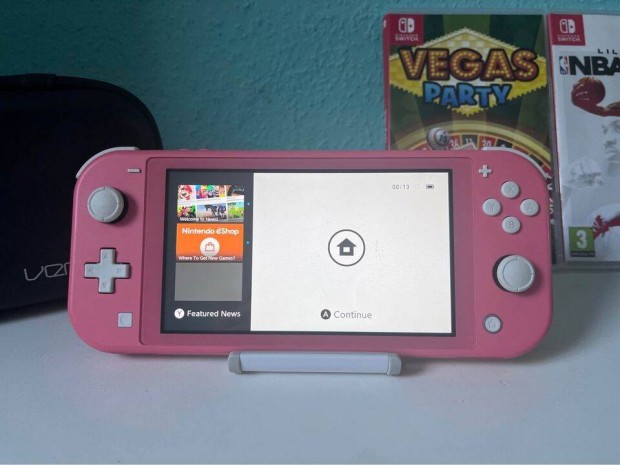 Nintendo Switch LITE CORAL Jtkokkal Konzolbeszmtssal