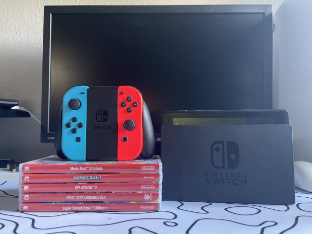 Nintendo Switch + 5 jtk + tok + 128 G trhely