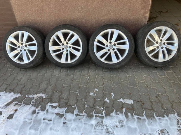 Opel 10 k�ll�s alufelni, 5x115 mm, 18-as, ny�ri gumival