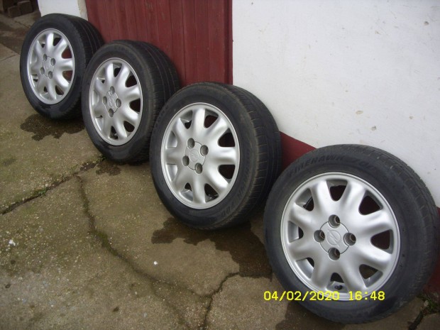 Opel 14" gyári alufelni gumikkal eladó!