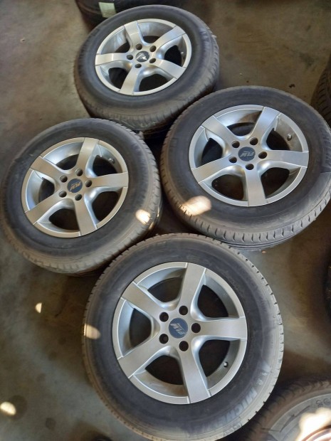 Opel 5x110-as 7x15" jszer Plw alufelni, 205/65R15 hasznlt Michelin