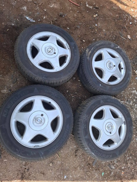 Opel 6Jx15 ET49 4x100x56,5 Alufelni Garnit�ra Gumikkal